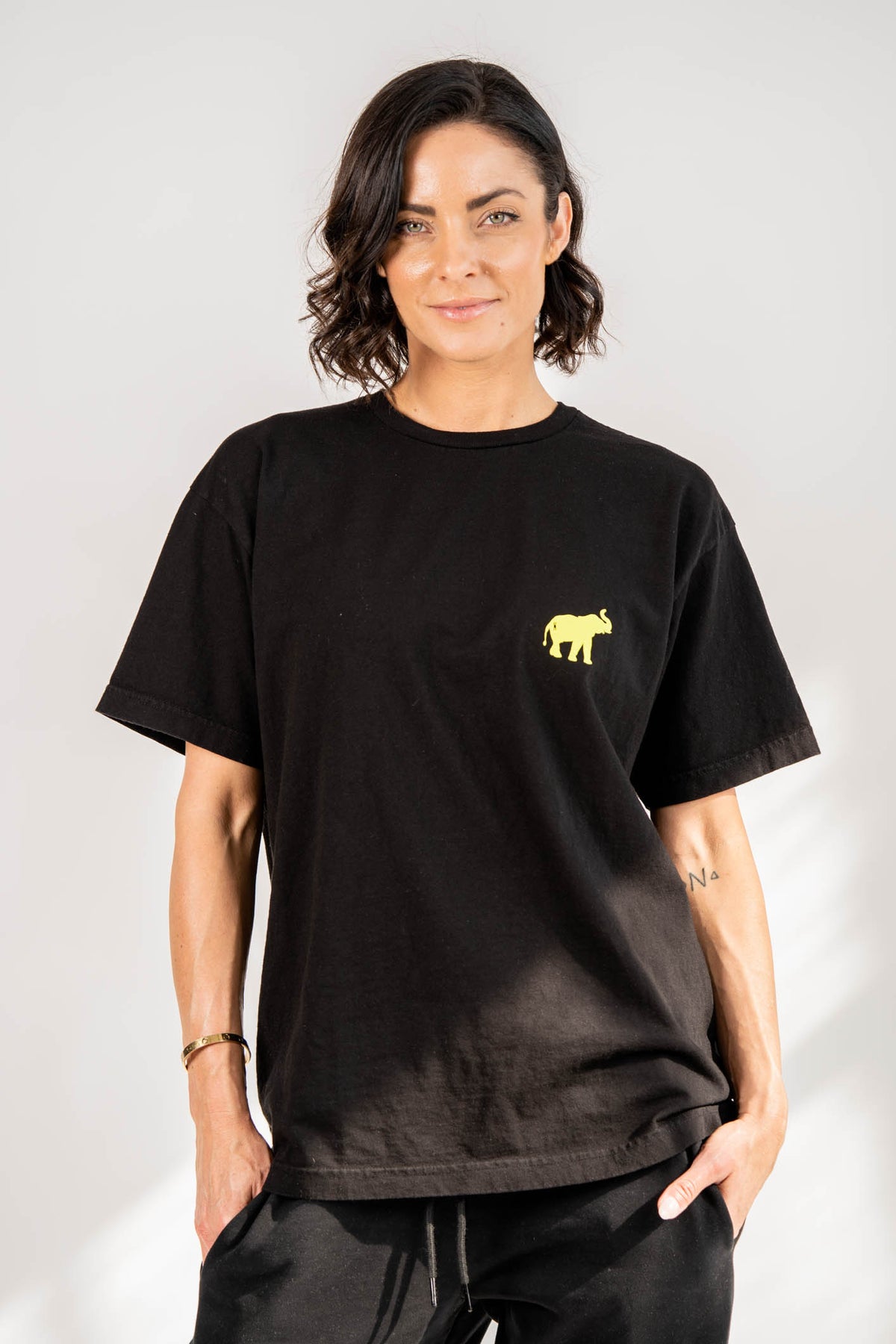NBDY CARES TEE in BLK/VLT